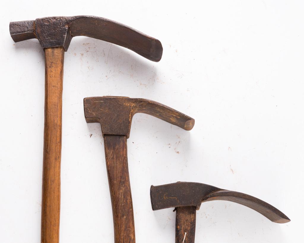 3 Antique Carpenter's Adzes: First tool is stamped with the letters "JM". Overall length of 21", steeled edge with head measuring 9.25" in length. Blade width is 3.5". Next is a straight handled adze with length 30.5", head lengt