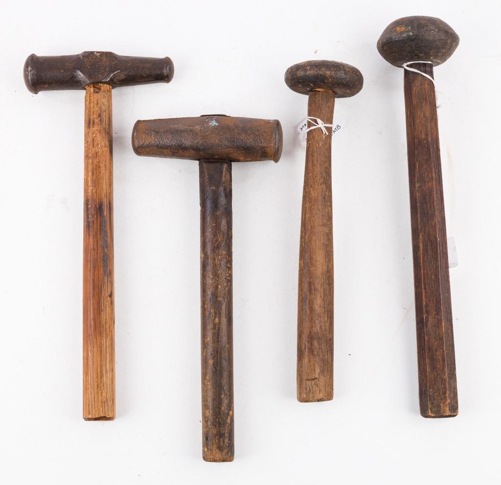 Antique Napping and Peening Hammers: First item of four is an antique stone napping/macadam mason's hammer with length of 13" and diameter of 2.5" with original handle. Second piece is stamped by the maker "Plumb". 10.75" in length, 2.5"