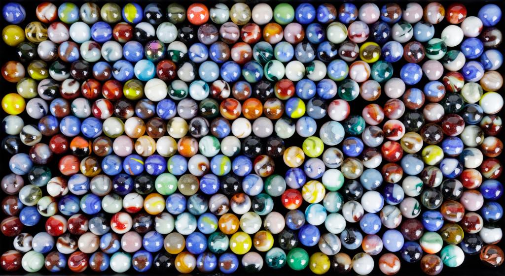 Marbles: Lot includes a variety of marbles. See photos.