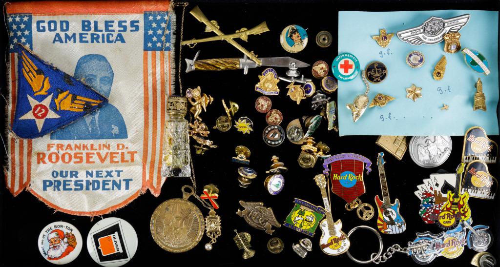 Souvenir & Advertising Pins: Lot includes a variety of souvenir and advertising pins from locations such as Hard Rock Cafe, Lions Club, religious, Harley Davidson, and more. There is also a patch, perfume bottle and President Roo