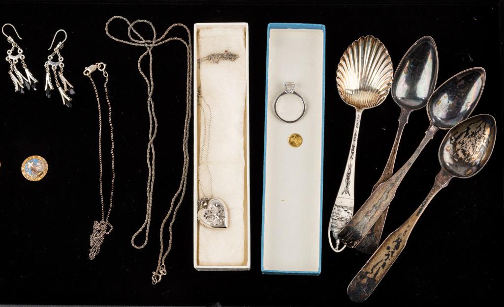Sterling Jewelry & 22K Gold Token: Sterling items including 3 necklaces (one with heart pendant marked J Ster), 1 ring with test hardness of CZ (size 7.5), 1 spoon (marked sterling with makers mark B in a diamond), 22K gold token (<0.1