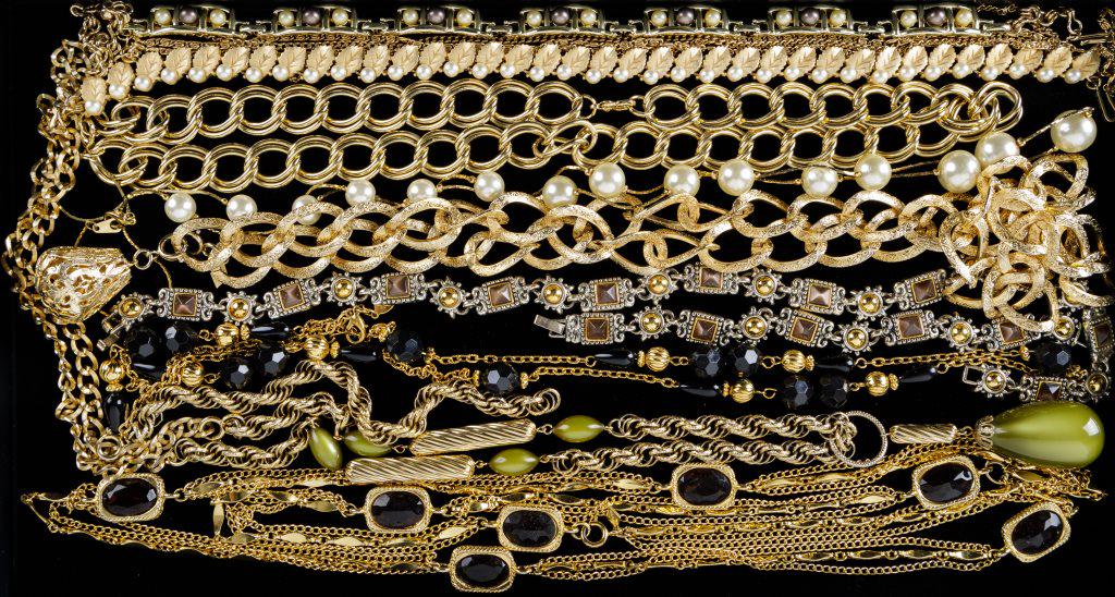 Gold Tone Jewelry: There are approx 9 gold tone costume necklaces. None of them appear to have makers marks. Good condition.