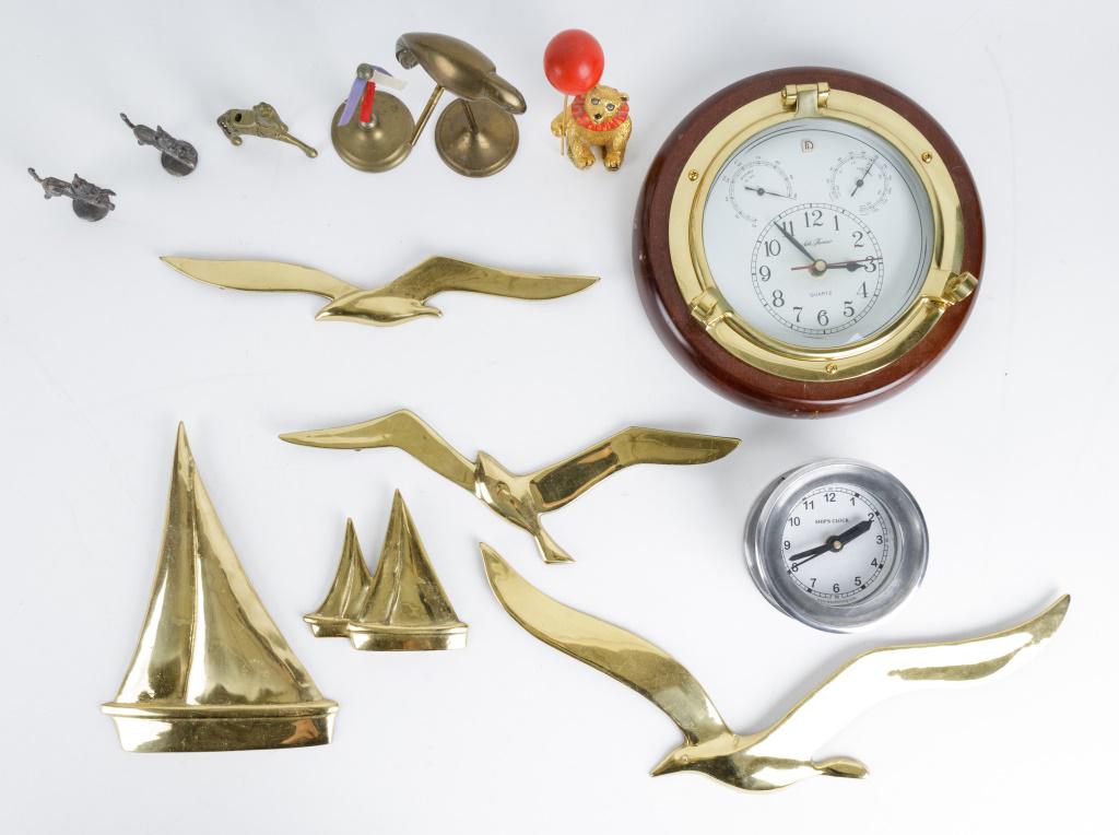 Clocks & Brass: Two clocks including "Ships Clock" and Seth Thomas quartz clock (approx 10" dia)(runs, not tested for accuracy). Several brass decorative items include seagull and nautical wall decor, pewter figurine