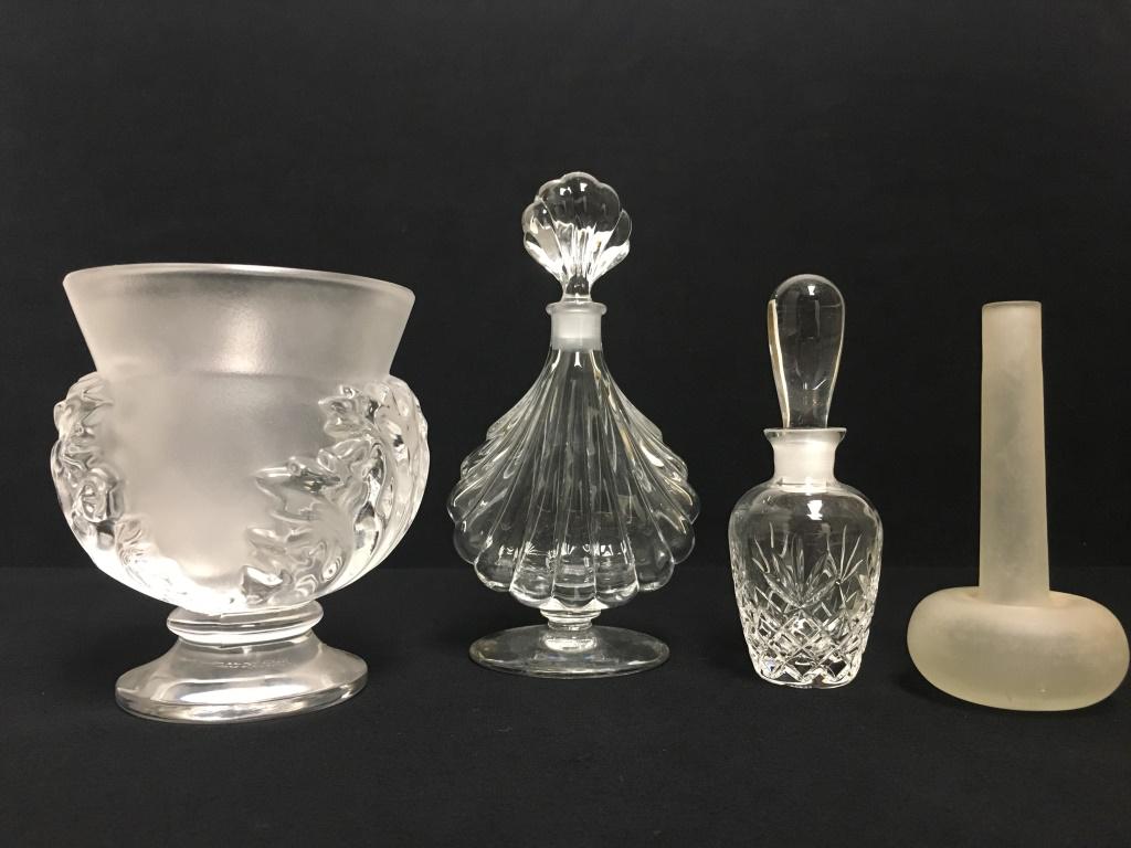 Lalique Vase, Baccarat & Lenox Perfume Bottles: Lalique 4.5" vase, Baccarat perfume bottle with stopper both marked, Lenox perfume with stopper (has chip on bottom) and a small genie shaped frosted bud vase or perfume bottle.