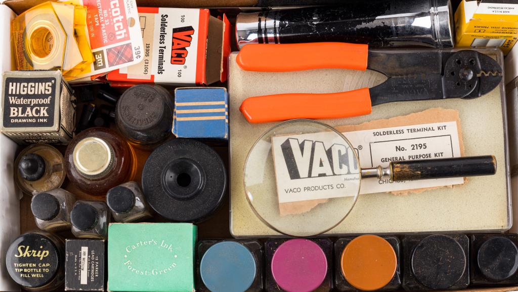 Vintage Desk Items, Lock, Ink, More: Vintage magnifying glass, Eveready flashlight, Master lock and key in OB, black billfold with NB on snap, Scotch electrical tape, solderless terminals and kit. Also 3 small glass bottles of Liberty Co