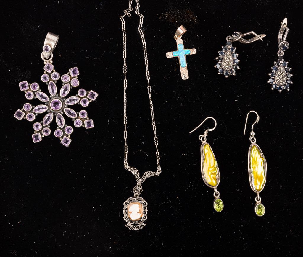 Estate Sterling Semi Precious Jewelry Collection: Highlights include sterling silver large amethyst pendants, approx. 3"dia, opal cross, sapphire marcasite earrings, cameo and more. ...