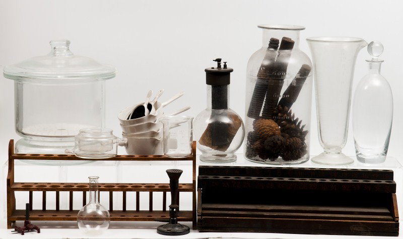 Chemistry Equipment: Large grouping of chemistry equipment including test tube holders, beakers, bunsen burner, etc.; from the L.H. Bohning Collection