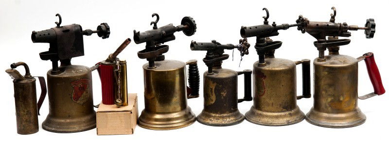 Grouping of Blow Torches: Seven early 20th C brass and copper blow torches including a boxed mini Spit-Fire blowtorch and four Clayton and Lambert; from the L.H. Bohning Collection