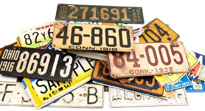 Large Collection Ninety-Four of License Plates: Ninety-four license plates including one MI, one HI, one TX, one AL, one SD, one ND, one NV, one SC, one NE, two MT, one MS, one ME, two FL, two CA, one WA, two IL, four KY, fifteen AK, four CT, twelv