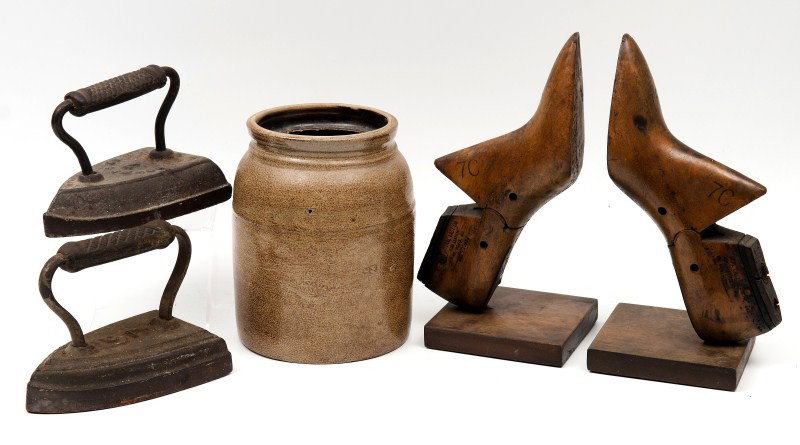 Crock, Bookends and Irons: Lot of a stoneware crock 7 1/2"h, a pair of shoe stretcher bookends, a Downs and Co iron and another iron