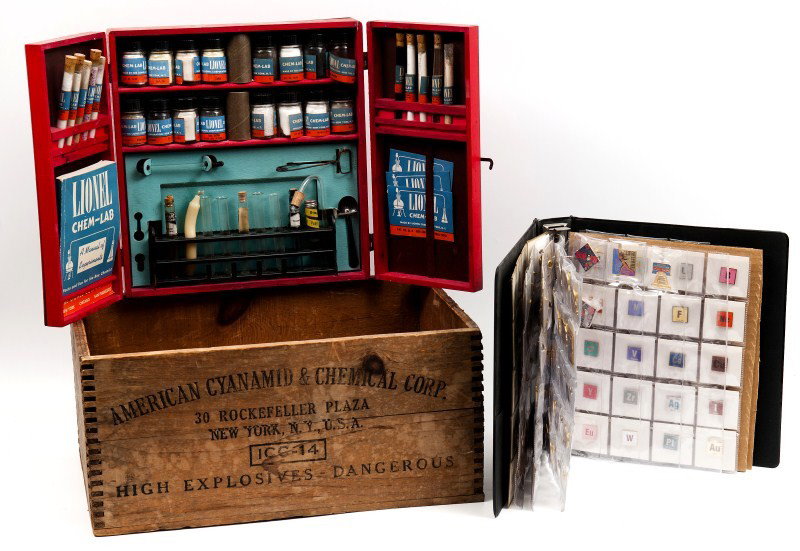Lionel Chemistry Lab, Pins and Transit Tokens: Lionel Chemistry Lab, appears to be complete in original case along with a wooden dynamite box, collection of sixty periodic table pins, other pins and PA transit tokens