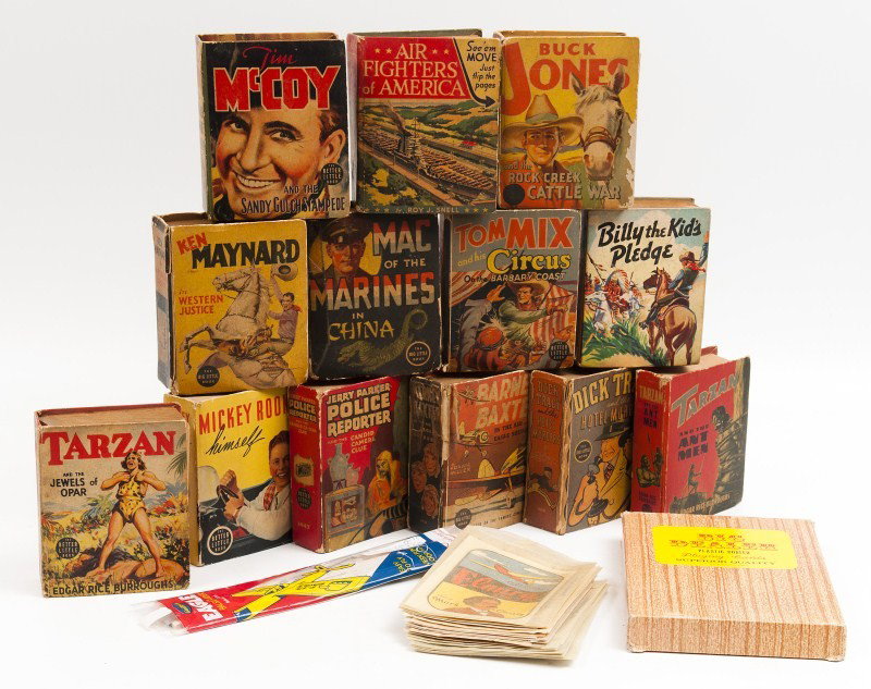 Big Little Books: Grouping of thirteen Big Little Book's including Tarzan, Barney Baxter, Air Fighters of America, Tim McCoy, Buck Jones, Ken Maynard, Mac of the Marines, Tom Mix, Billy and The Kid's Pledge, Mickey Roo