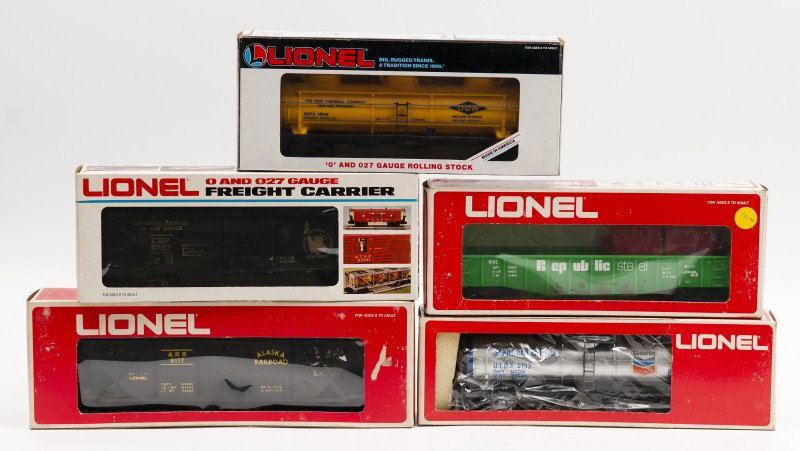 Lot of Five Lionel 9117, 16112, 9142, 9787, 9153: Lot of five Lionel 9153 Chevron Tank Car, 9787 Jersey Central Box Car, 9142 Republic Steel Gondola, 16112 Dow Chemical Three Dome Tank Car, 9117 Alaska RR Covered Hopper; all in original boxes