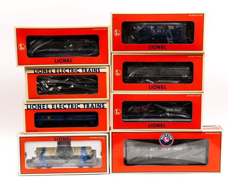 Lot of Eight Lionel 16454, 16138, 26100, 16124, 19: Lot of eight Lionel cars including 17800 Ore Car with Load, 26100 TC Single Dome PA, 16187 Linex Three Dome Tank Car, 16138 Goodyear Single Dome Tank Car, 26103 TC SDM Tank Train, 19615 Bulcan Tank Ca