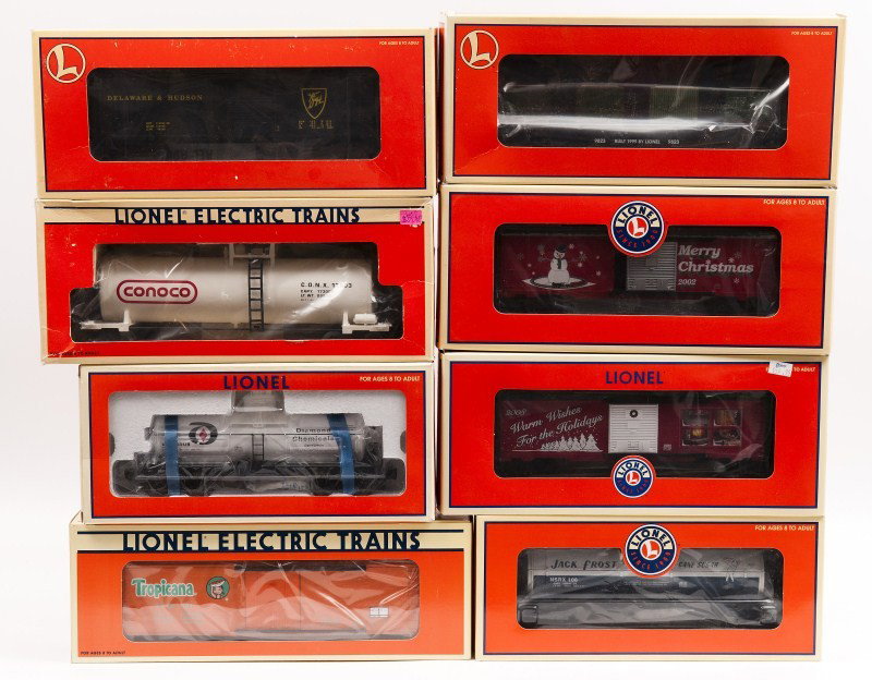 Lot of Eight Lionel 19626, 17903, 26137, 26224, 25: Lot of eight Lionel including 36203 Christmas Box Car 2002, 19626 Diamond Chemicals Tank Car, 17903 Conico Tank Car, 26137 Jack Frost Sugar Dome Car, 17308 Tropicana Refer #2, 26332 Martin Guitar Flat