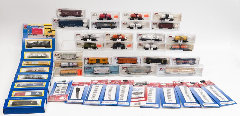 Thirty Three N Scale Atlas, Model Power and Life L: Atlas trains include 32511 Beer Can Tank GEIGY Chemical, 3244 Beer Can Stank Standard Chemical, 32331 Beer Can Tank DOW Chemical, 32431 Beer Can Tank DuPont, 3237 Beer Can Tank Hooker, 3231 Beer Can T