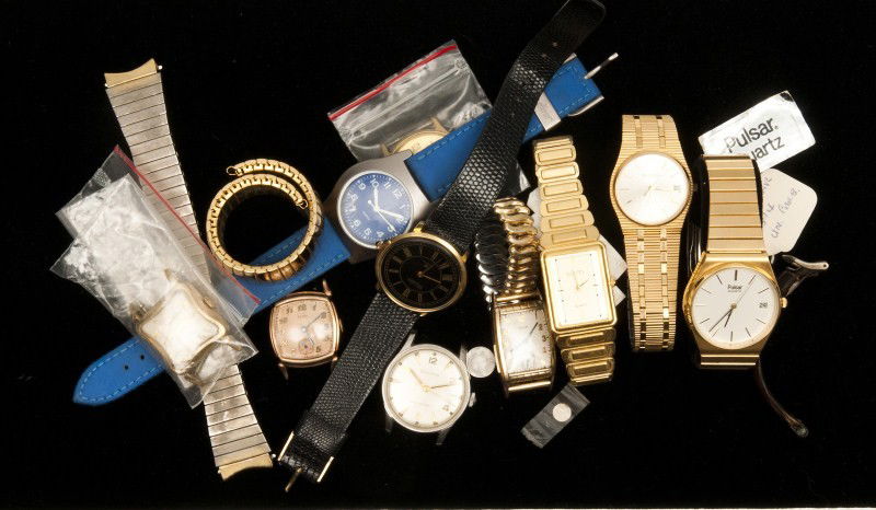 Men's Wrist Watches: Ten various gold-filled and fashion wrist watches and bands, including Elgin, Gruen, Gucci, Pulsar, Bulova, etc.