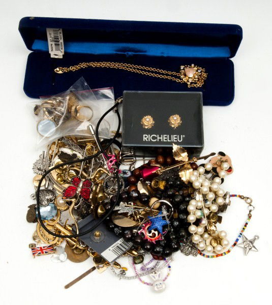 Costume Jewelry: Including a Trifari necklace & earring set; faux pearls; beaded bracelets; pins; earrings; rings; tie tacks; etc.