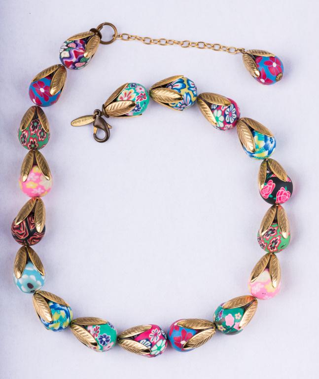 Lenora Dame Floral Statement Necklace: Lenora Dame gold tone tulip floral necklace measures approx 20" L.