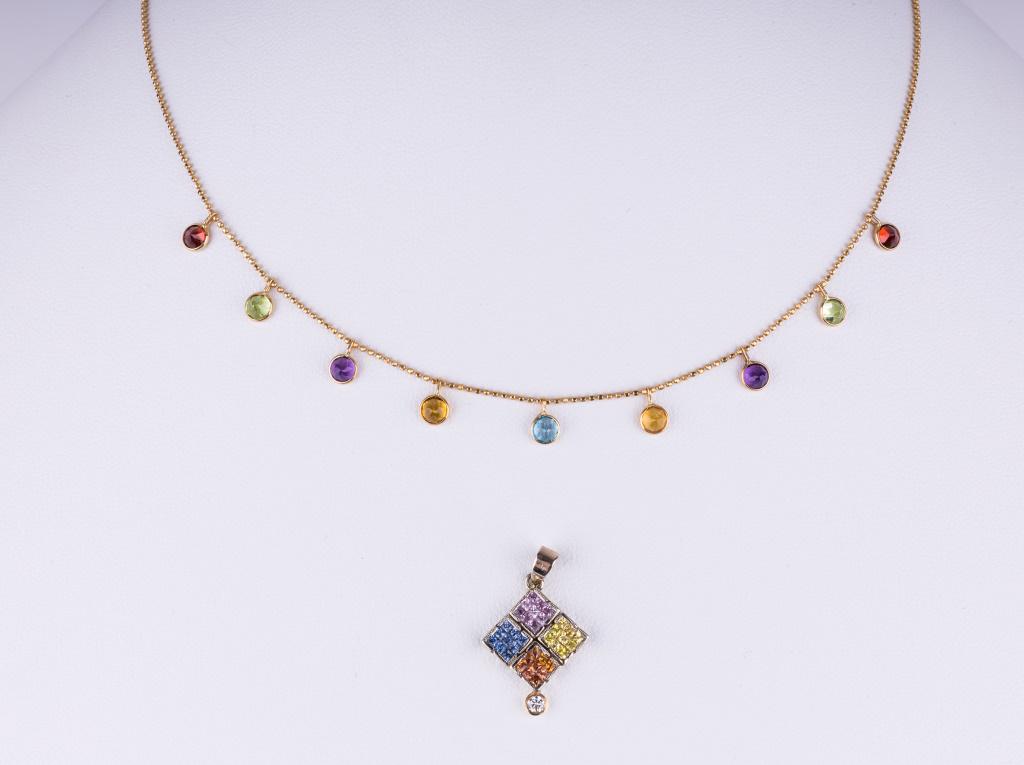 14K Gold Multi Color Gemstone Necklace & Pendant: 14K gold necklace and pendant with multi-color gemstones. The necklace measures approx 15" L and the box shaped pendant has multi colored gems including a diamond chip as the bottom accent. Total weig