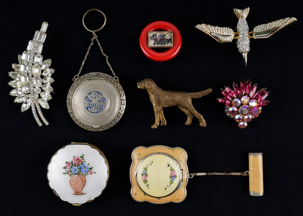 1920s Era Enamel Compacts & Vintage Rhinestones: 1920s Era Enamel Compacts including white, silver toned and yellow compact. The White compact has some loose at two scalloped edges & the lot also includes a round brooch (passably bakelite) a spring
