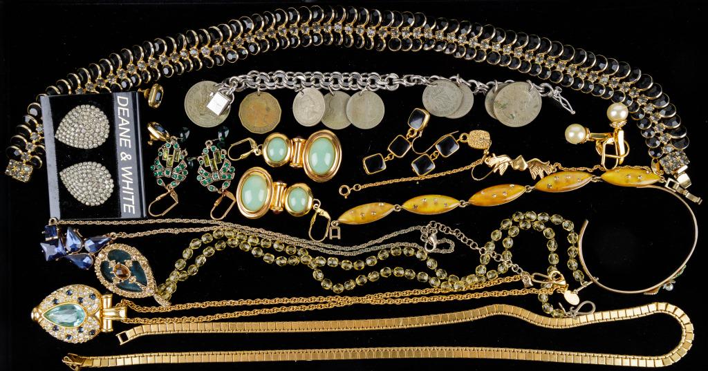 Vintage Gold Tone Jewelry: Lot of vintage gold tone jewelry consists of 5 necklaces (one is a locket, opens and closes well), long Monet (approx 24" L) gold tone necklace, Nolan Miller necklace with blue stone and others. There