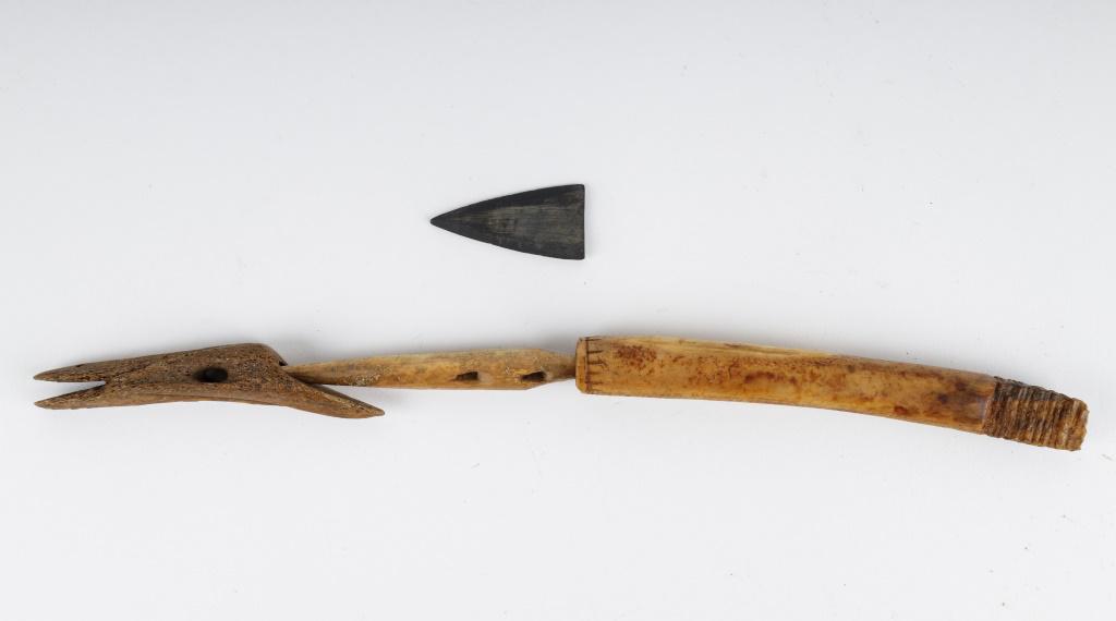 Antique Inuit Seal Harpoon (3 Parts): Antique Inuit inupiaq (Inupiak) artifacts from Savoonga, Wales & Koyuk, Alaska. This antique seal harpoon consists of primary socket, intermediary shaft and harpoon head with slate stone blade. Has a 