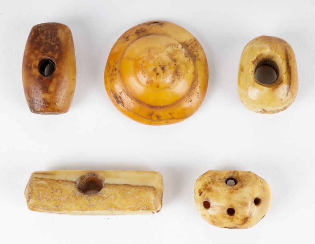 Antique Inuit Buttons & Toggles: Antique Inuit inupiaq (Inupiak) artifacts from Savoonga, Wales & Koyuk, Alaska. Lot includes toggles and buttons. Largest is toggle approx 1.5" L.