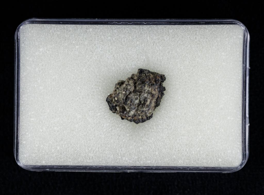Martian Meterorite Gadamis 001 Shergottite Libya: This Martian Gadamis #001 meteorite was found in Libya in 2019 and weighs approx 1.2g. This meteorite is registered and comes with the certification and registry paperwork.