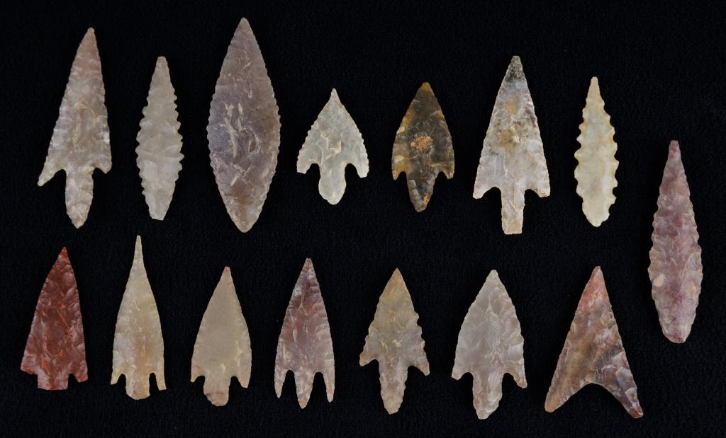Neolithic Gem Grade Arrowheads (15): This lot consists of 15 Neolithic gem grade arrowheads made of colorful flint from Mauritania. The largest measures approx 2 1/8" L.