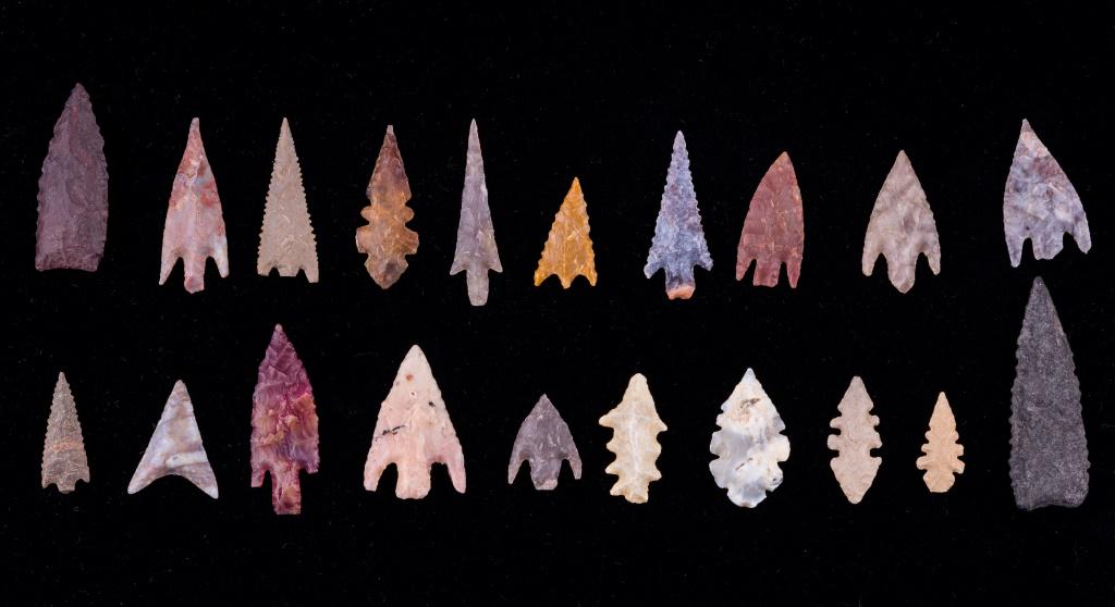 Neolithic Gem Grade Arrowheads (20): This lot consists of 20 Neolithic gem grade arrowheads made of colorful flints from Mauritania. The largest measures approx " L.