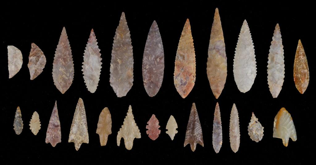 Neolithic Gem Grade Arrowheads (24): This lot consists of 24 Neolithic gem grade arrowheads made of colorful flints from Mauritania. The largest measures approx 2.75" L.