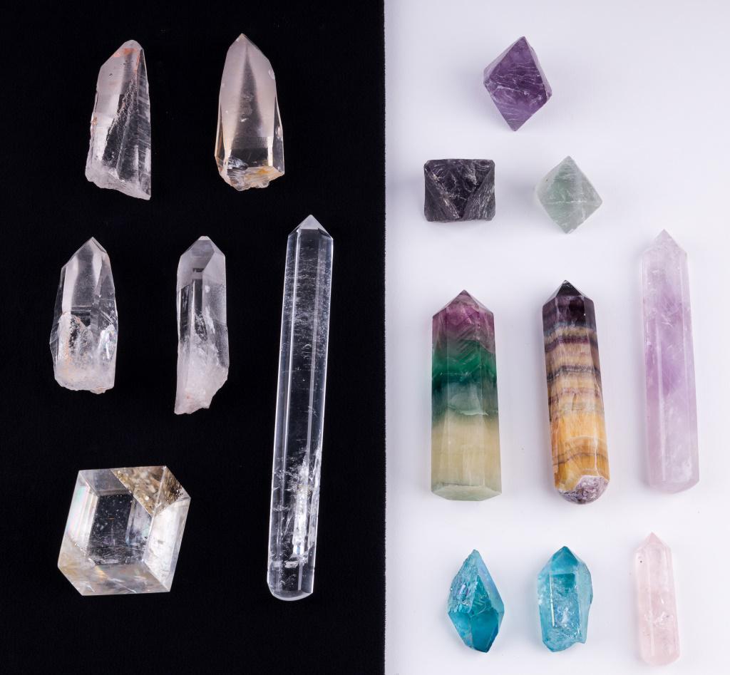 Natural Crystals & Wands: Lot consists of fluorite wands (2), fluorite crystals (3), amethyst wand (1), aura quartz (2), lemurian quartz crystals(4), quartz wand, rose quartz wand, calcite. The quartz wand measures approx 6.75