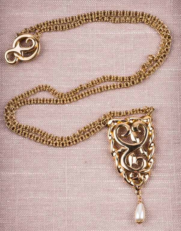 Givenchy Gold Tone Necklace: A beautiful Givenchy 34" double links chain necklace with a 3" pendant. The necklace has a large toggle closure with a stylized double fish hook design. The Givenchy logo is stamped on the back of the