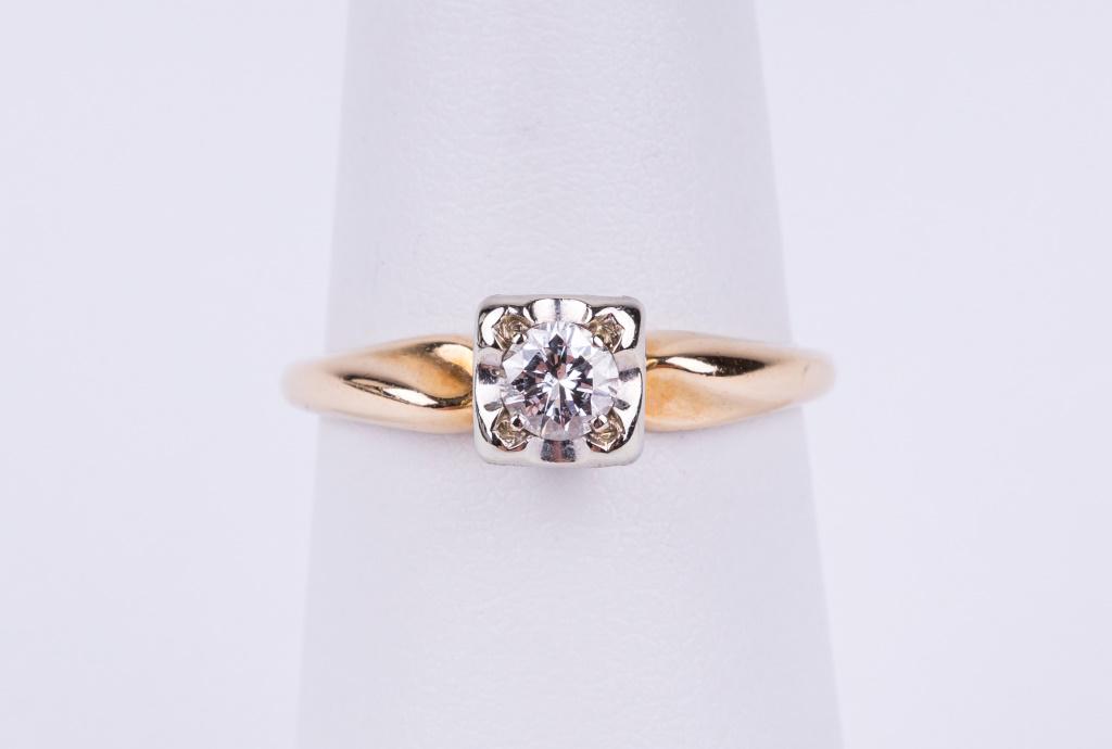 Vintage 14K Diamond Ring: Yellow gold ring with round-cut diamond weighing approx. .16 ct, slightly yellow, I clarity, mounted in a basket style head. Ring approx size 6 and weighs approx 1.47 dwt.