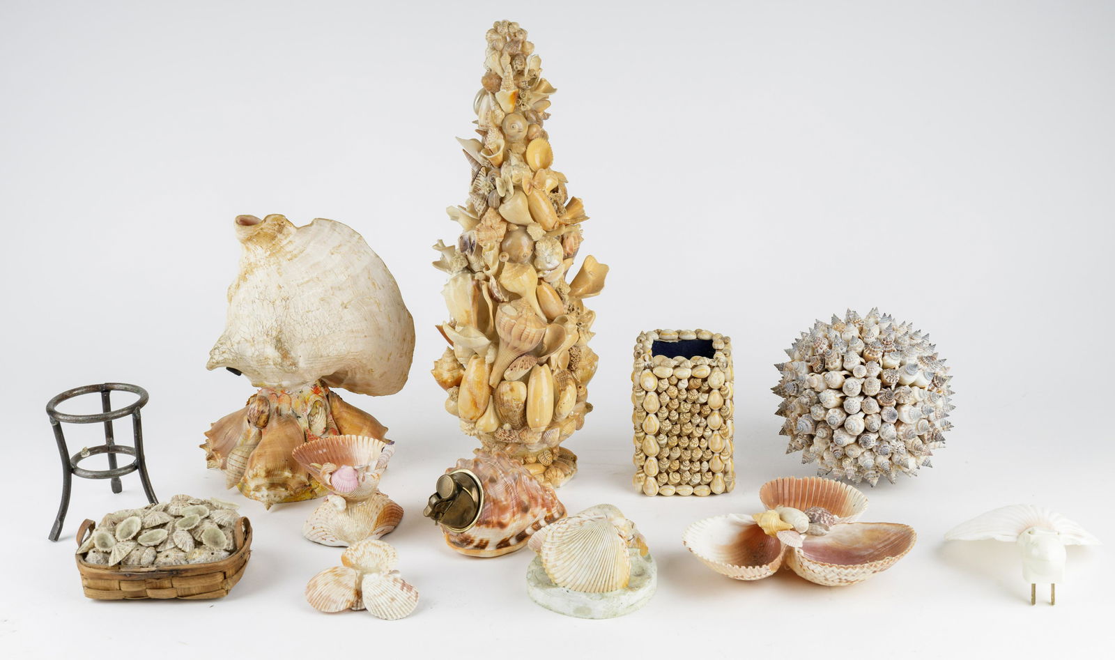 Collection of Shell Art Decorative Items: Lot includes contemporary and vintage items including a conch shell lamp (base only), nightlight, pen holder and various crafted decorative items. The largest measures approx 15" H. See photos.