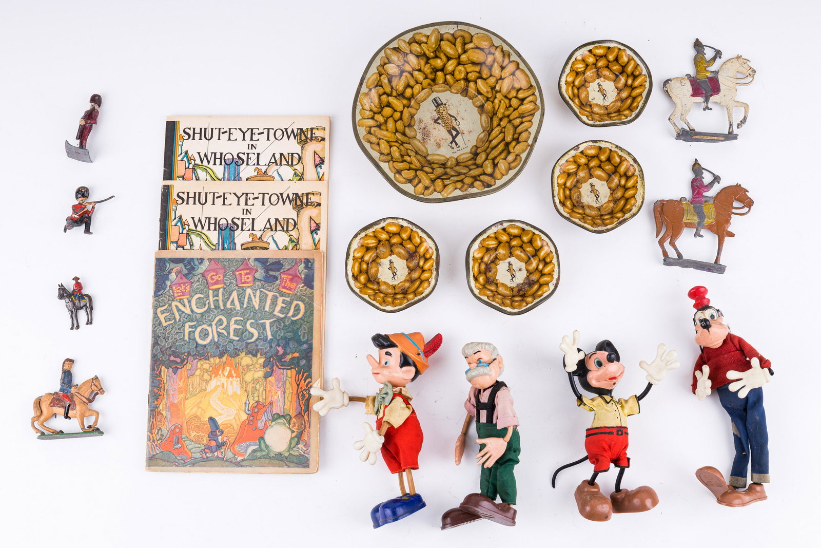 Early 20th Century Toys and Books: Includes two copies of 1929 antique "Shut-eye-towne in Whoseland" and "Lets Go to the Enchanted Forest" (1927). Books published by John Wanamakers Philadelphia, also including four Mr Peanut, Peanut b