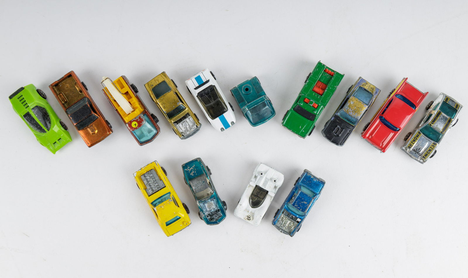 Vintage Red Line Hot Wheels & Parts: Lot of 14 red line Hot Wheels in various conditions. Some are for parts and restoration and some complete. Three are missing car hoods. See photos.