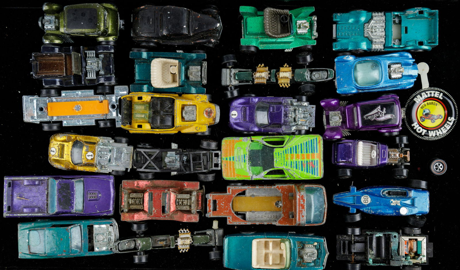 Vintage Red Line Hot Wheels & Parts: Lot of 24 red line Hot Wheels cars and chassises in various conditions and a Mattel button and two wheels. See photos. Many are parts and restoration, some complete.