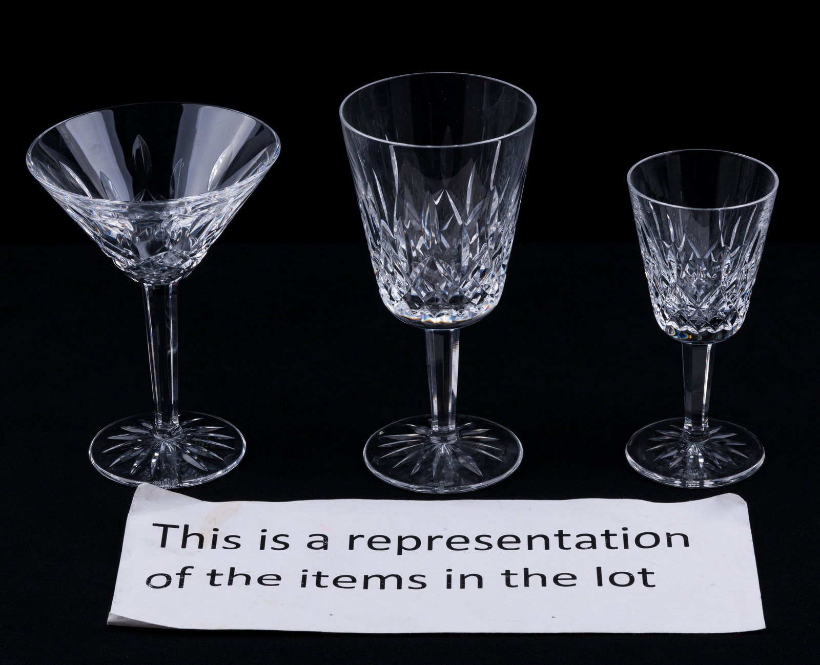 Waterford Crystal Stemware: Lot includes 9 martini glasses (approx 6" H), 12 dessert wine glasses, wine glasses (approx 7" H)