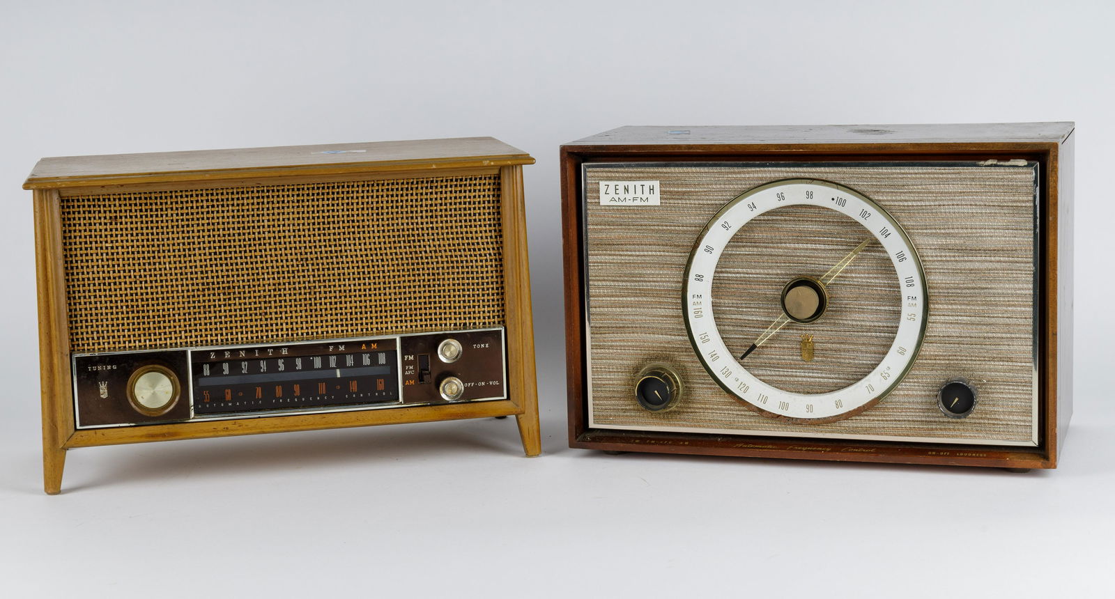 Vintage Zenith Radios (2): Zenith radios are both in working condition when plugged in. Both are AM / FM radios. Model numbers S-46917 and S-58040.