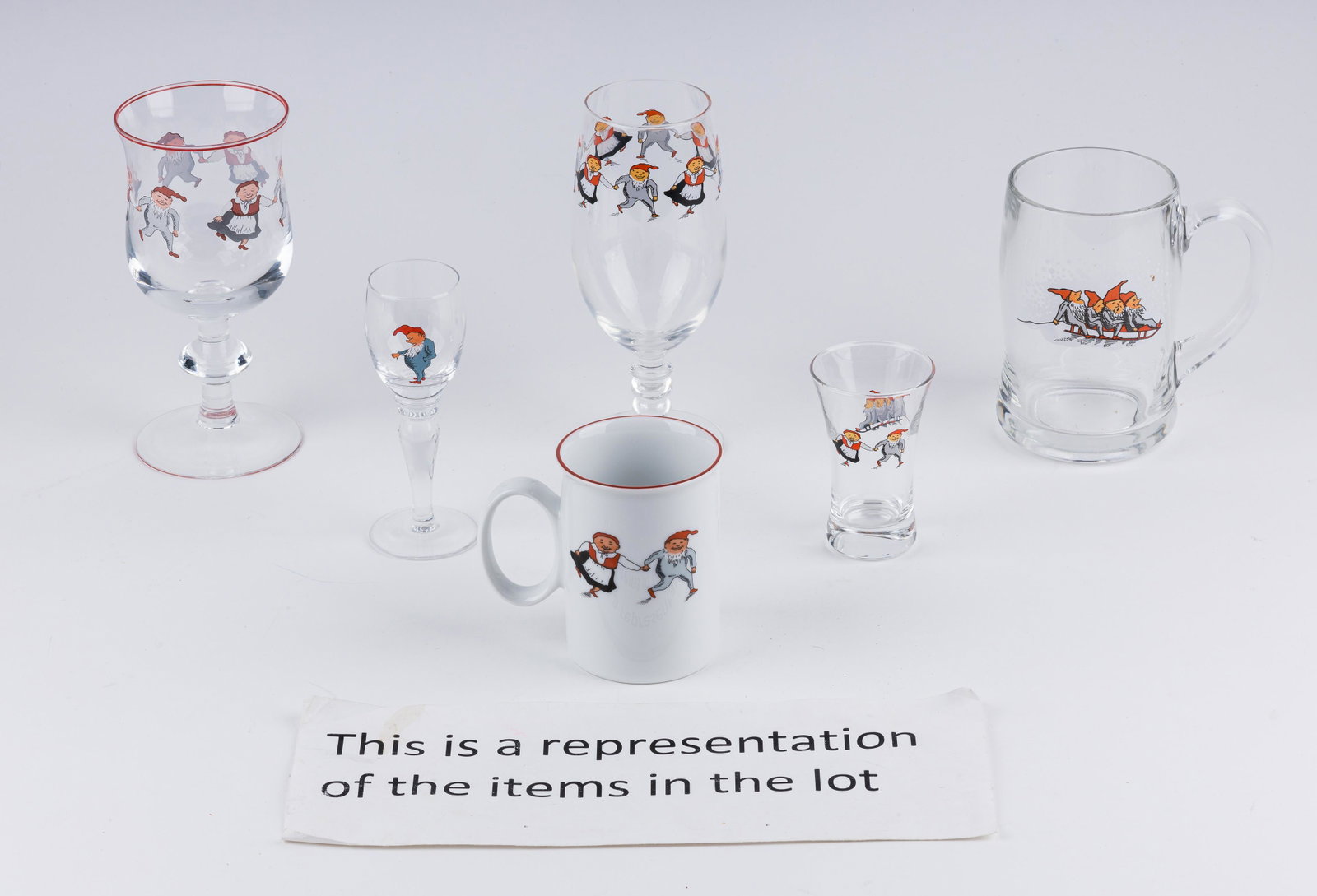 France Luminarc, & Other Gnome Glasses: Lot includes eight unmarked gnome shot glasses, three wine lumanarc wine glasses, unmarked cordials, three water glasses (two have fading). One mug marked France, and five mugs marked "Porsgrund". All