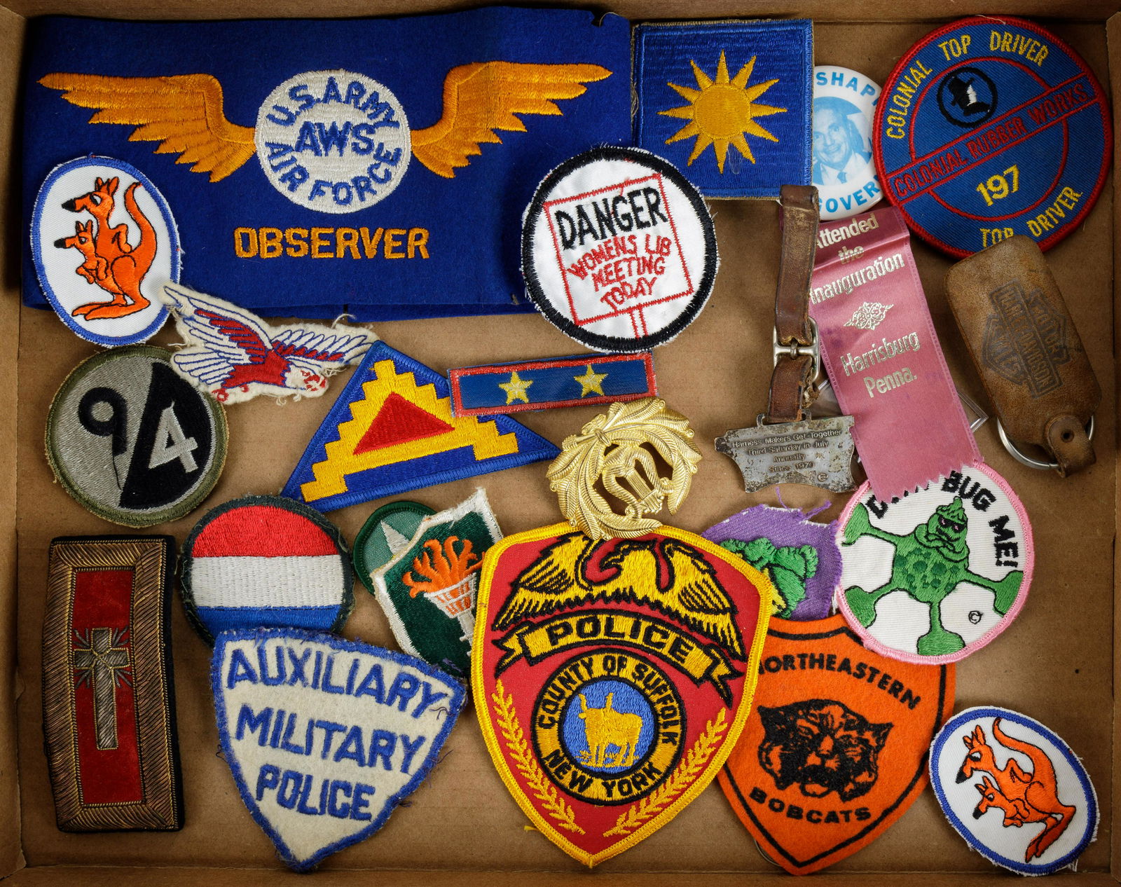 Vintage Patches, Pins & More: Lot of vintage patches and others includes AWS U.S. Army / U.S. Air Force observer band, political, police, etc. Also included is a leather Harley Davidson key ring and others. See photos.