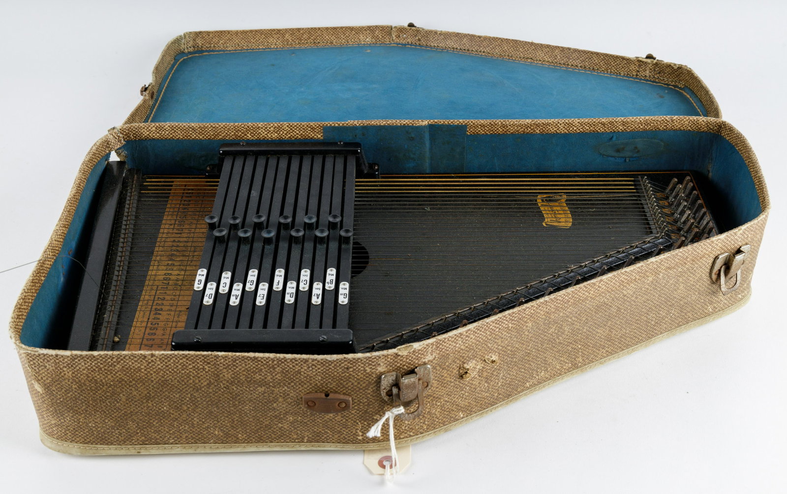 Vintage Oscar Schmidt Autoharp: Vintage Oscar Schmidt auto harp with case. Appears that one string is broken. It has not been tested. Case has some damage. See photos.