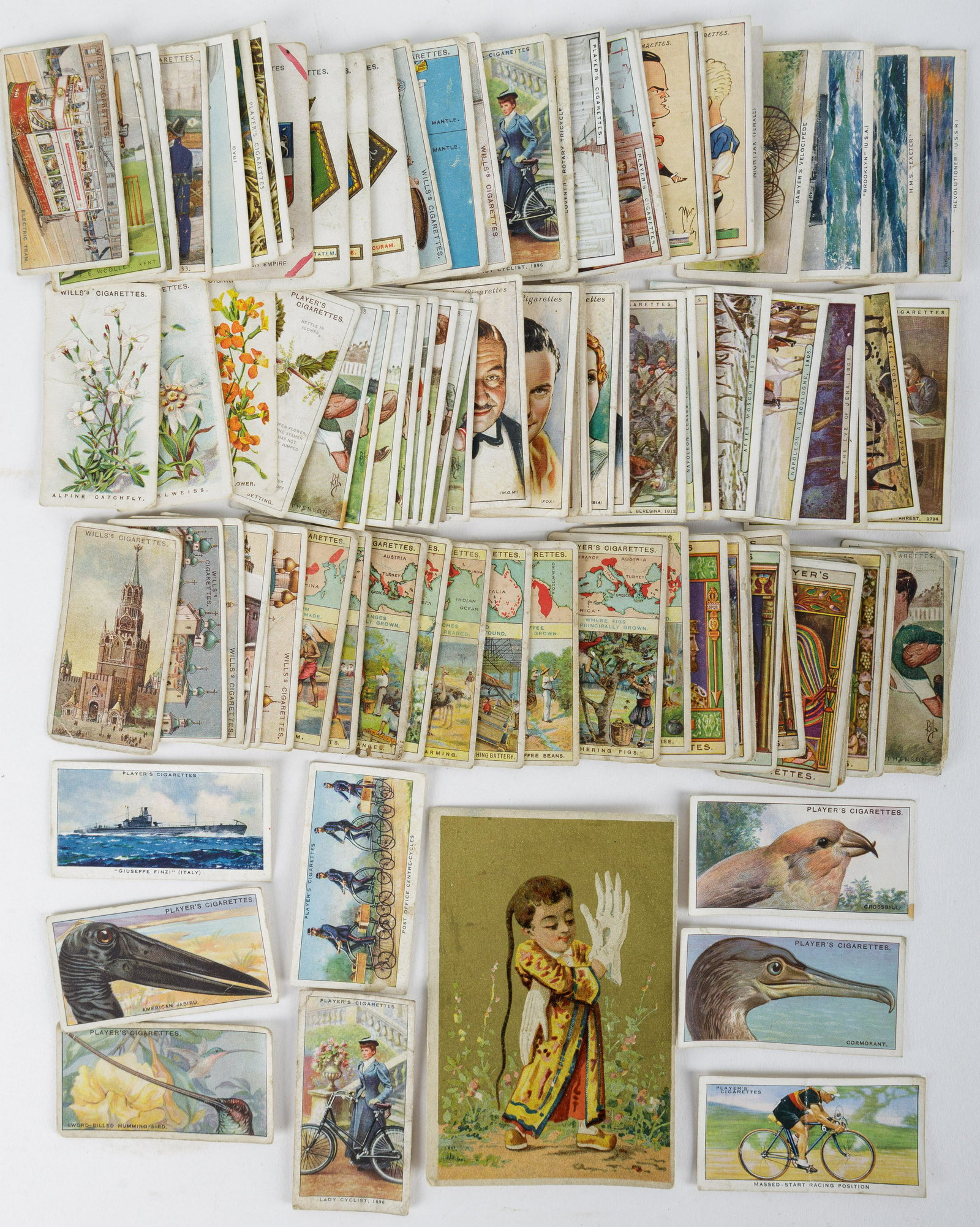 Vintage Wills & Player Tobacco Cigarette Cards: Lot of 100+ vintage Wills and Player loose tobacco cards with various subjects and in various conditions from fair to good. There is also a trade card for French perfume.