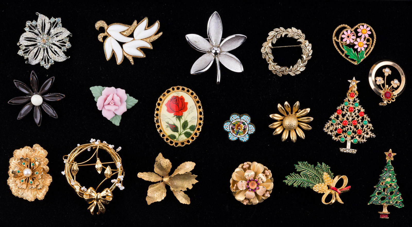 Vintage Costume Jewelry Brooches: Lot of 18 vintage brooches include names silver tone five leaf Crown Trifari brooch and other names include Monet, Sarah Coventry and Gerry's. There is also an early micromosaic brooch.