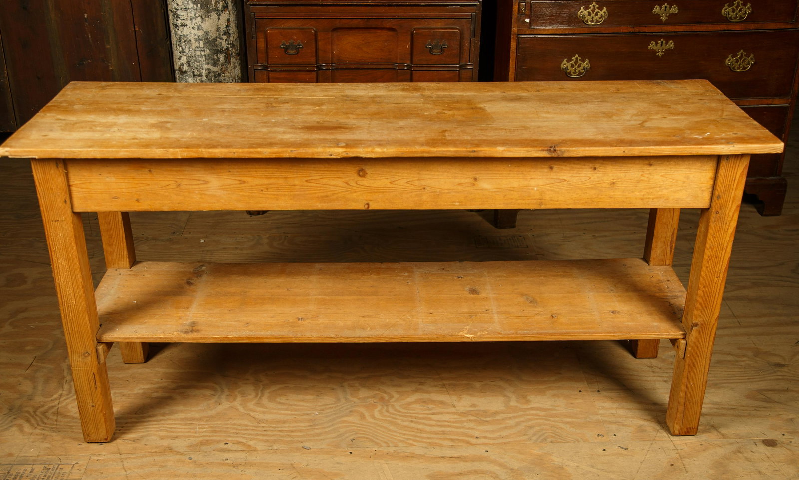Pine Farm Butcher Table: Farm / country store butcher table with shelf made of pine measures approx 61" L x 19" D x 30" H. Furniture Pick-up Availability-We will have staff available at our Hay Street Location on Thursday the