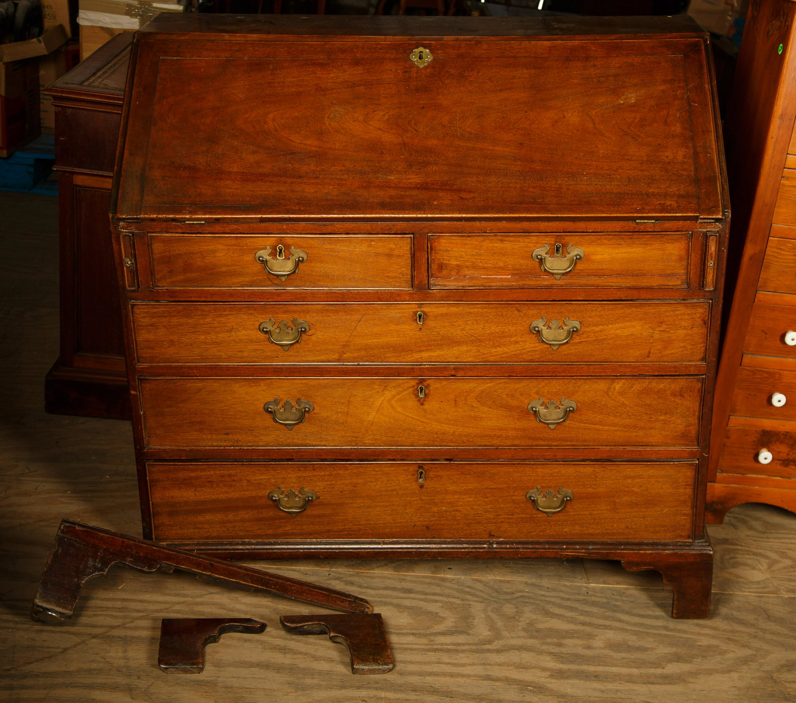 Chippendale Slant Front Desk, Period English: Chippendale, Period English, mahogany slant front desk measures approx 42" H x 41 1/2" W x 22 D. Brass pulls are not original and two left feet are detached inside drawer. Furniture Pick-up Availabili