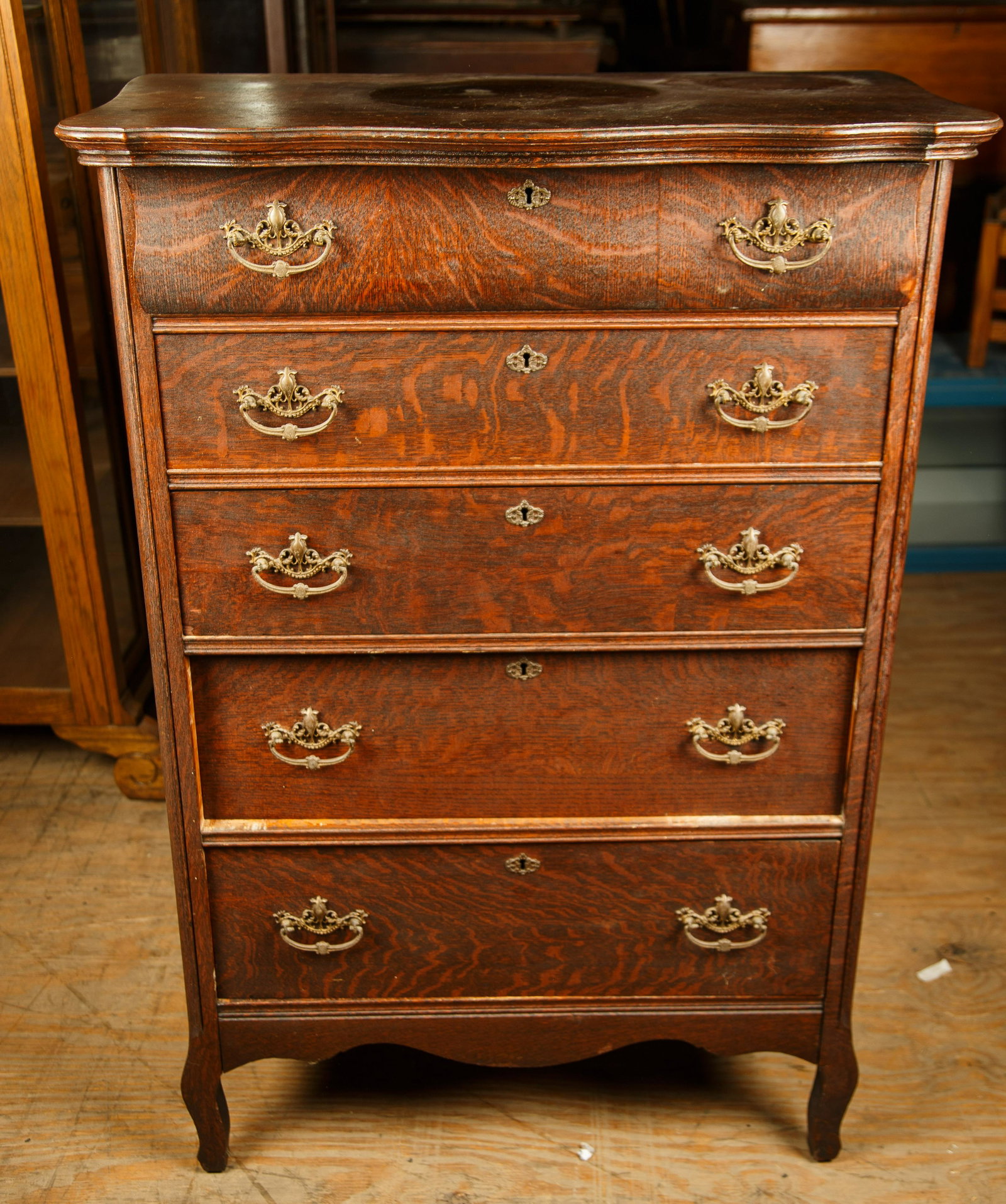 Late 19th C Golden Oak Chest of Drawers: This Late 19th century golden oak chest of five drawers has original pulls and measures 49" H x 19 1/2" D x 1" W. Furniture Pick-up Availability-We will have staff available at our Hay Street Location