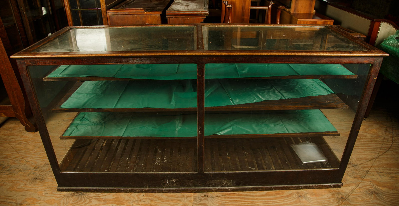 Oak Countercase Display Cabinet: It measures approx. 36" H x 73" W x 26" D and has three shelves. Furniture Pick-up Availability-We will have staff available at our Hay Street Location on Thursday the 20th and Friday the 21st or Thur